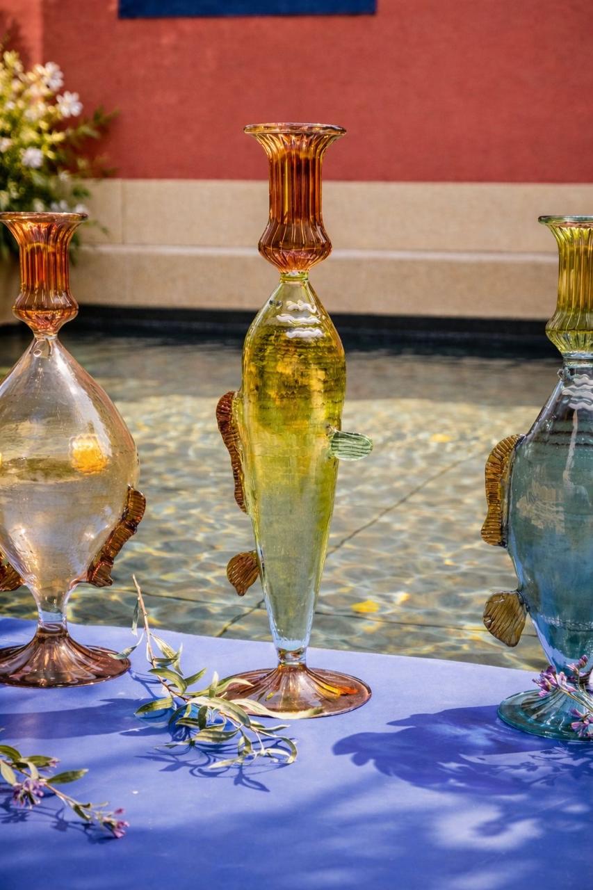Glass fish candle holder