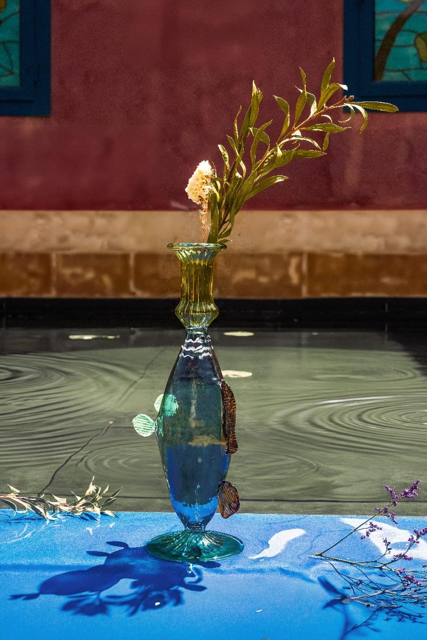 Glass fish candle holder